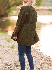 Textured cable knit duster cardigan in army green with long sleeves and an open front.