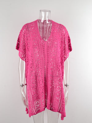 Hot Pink open-knit V-neck beach cover-up with short sleeves and tassel trim.