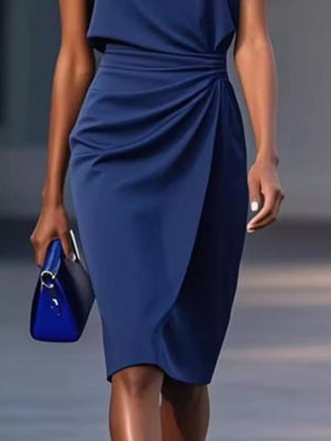 Navy ruched sheath dress with a keyhole neckline and tulip hem, 100% polyester.
