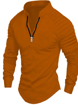 Caramel zip-neck pullover shirt with pleated sleeves and a quarter zip closure.