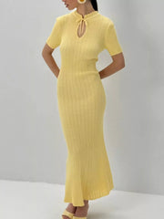 Pastel yellow knitted mermaid dress with short sleeves and tied neckline detail