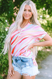 Prismatic stripe Henley blouse in blush pink with rolled sleeves and a relaxed fit.