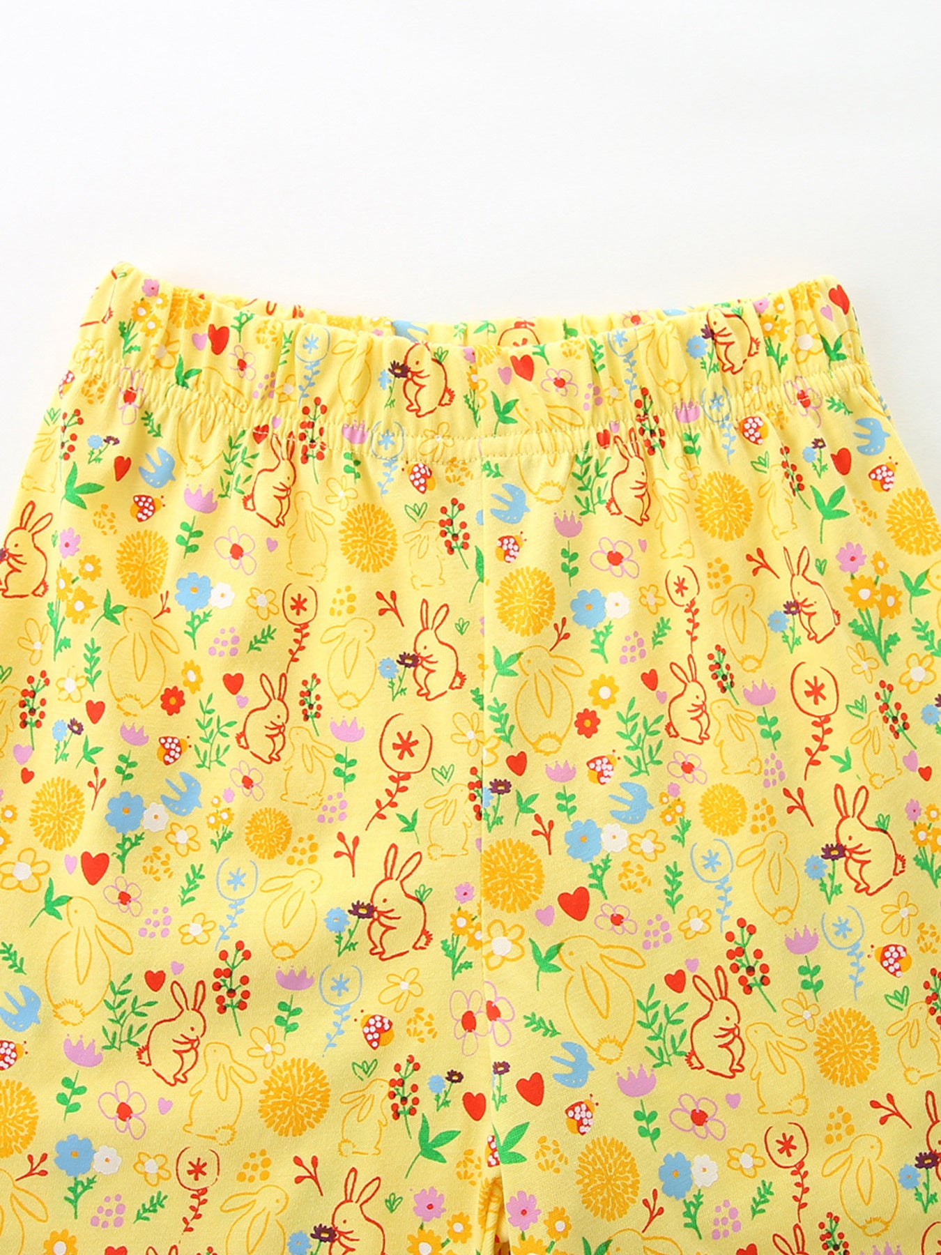 Yellow cotton toddler undershirt with allover bunny and floral print