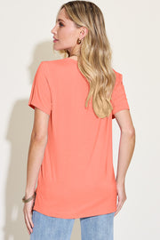 Coral bamboo t-shirt with asymmetric hemline and V-neck, short sleeves