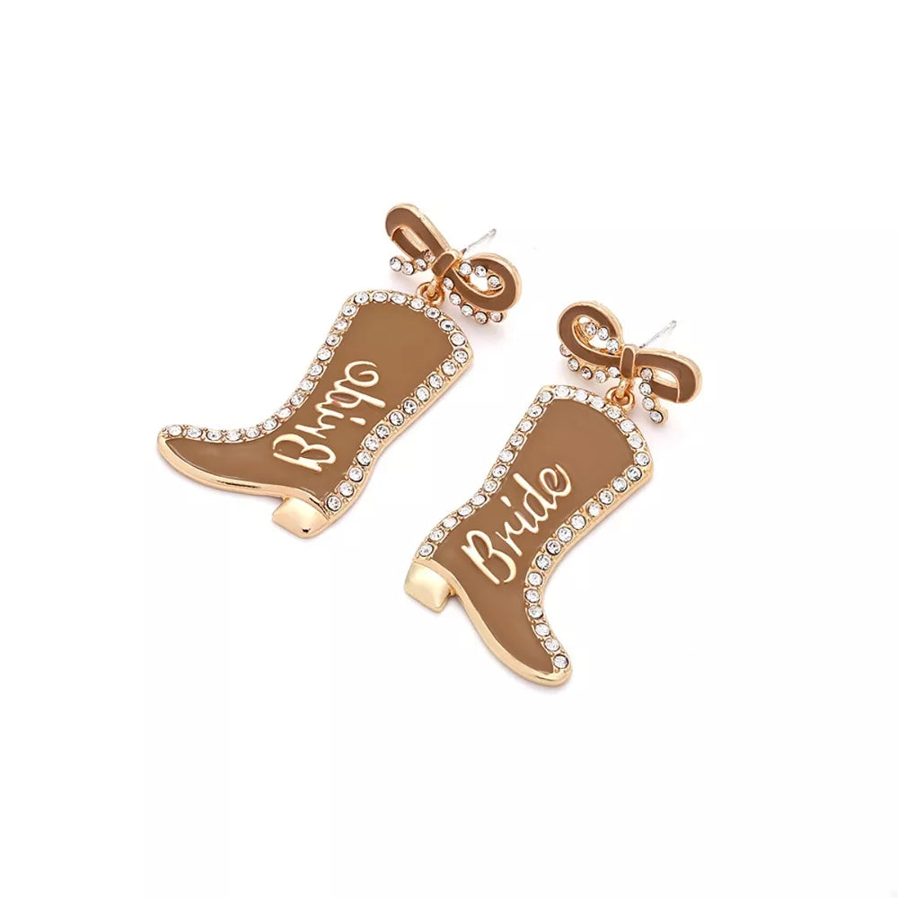 Brown bridal cowboy boot dangle earrings with crystal trim and bow detail.