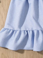 Sky blue baby dress with textured fabric and ruffled hem detail.