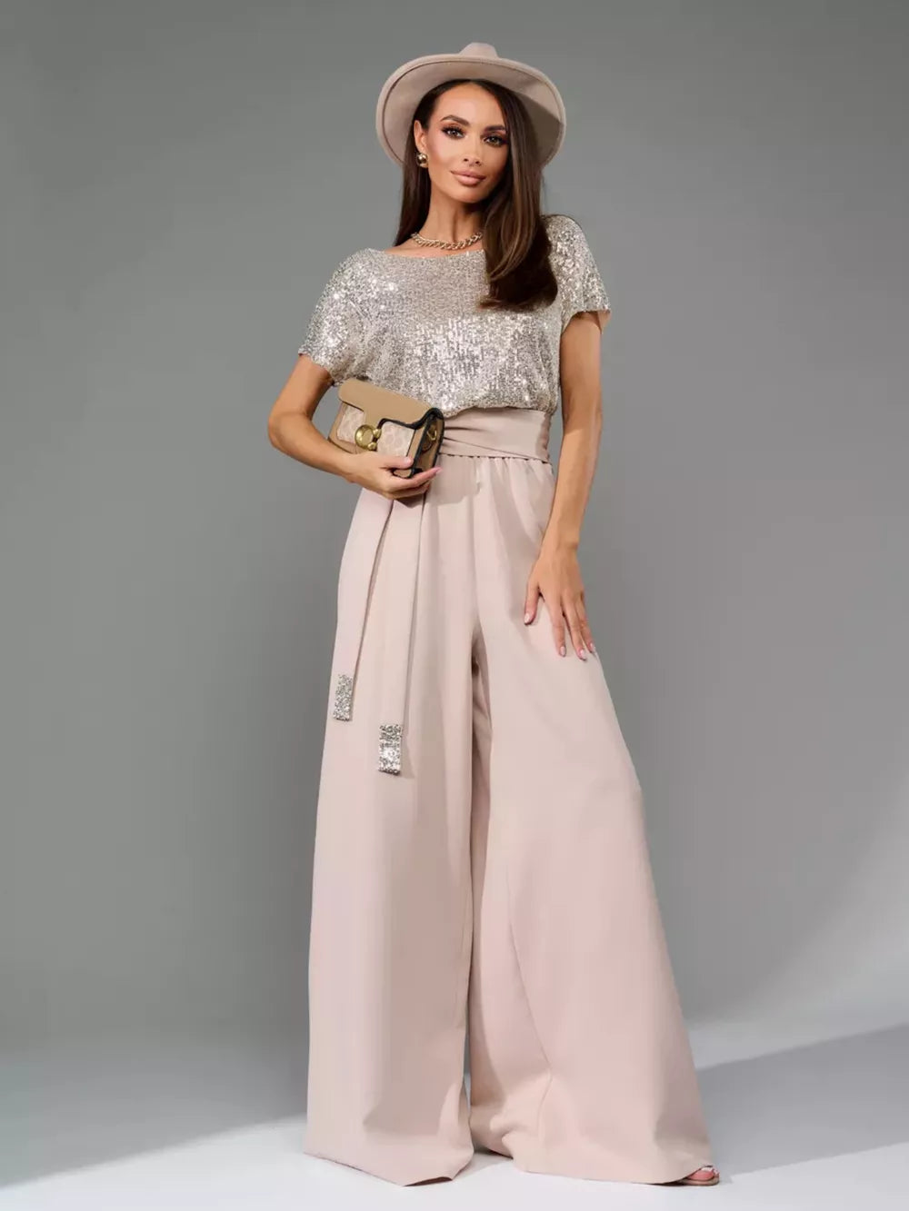 Shimmering sequin wide-leg jumpsuit with tie belt in apricot silver.