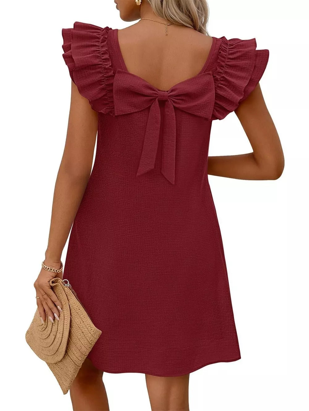 Burgundy a-line dress with ruffled cap sleeves and a large back bow detail.