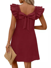 Burgundy a-line dress with ruffled cap sleeves and a large back bow detail.