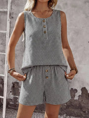 Black gingham two-piece set with button-down sleeveless top and shorts.