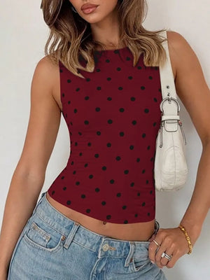 Wine red polka dot tank top with a cropped fit and round neckline.