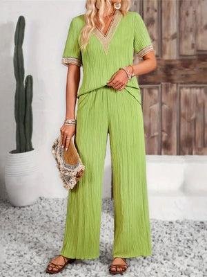 Lime crinkle knit v-neck co-ord set with wide leg pants and decorative trim