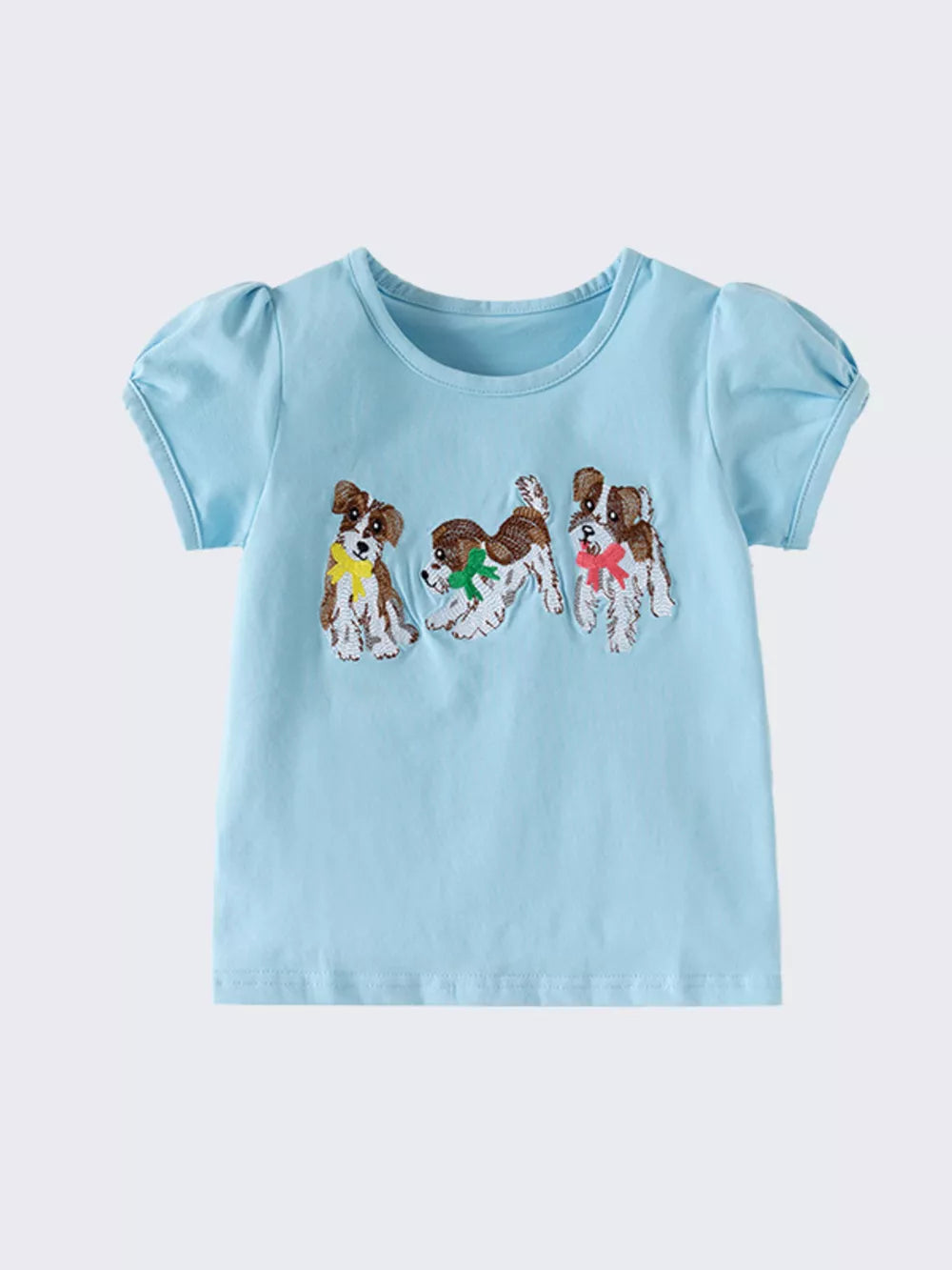 Light blue cotton blend toddler t-shirt with three embroidered puppies wearing colorful scarves and puff sleeves.