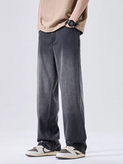 Men's relaxed fit sweatpants in a vintage-washed soot grey with a faded effect.