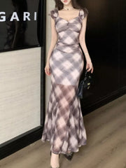Ruched plaid bodycon maxi dress in brown with sweetheart neckline and sheer mermaid skirt.