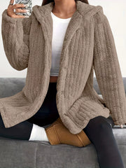 Cozy button-up fleece jacket in camel with a hooded collar and relaxed fit.