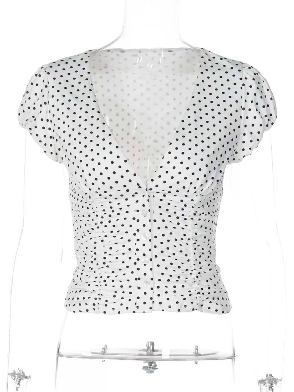 White polka dot ruched V-neck t-shirt with short sleeves and button front.