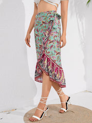 Paisley wrap midi skirt with ruffled hem in multicolor, tied at waist.