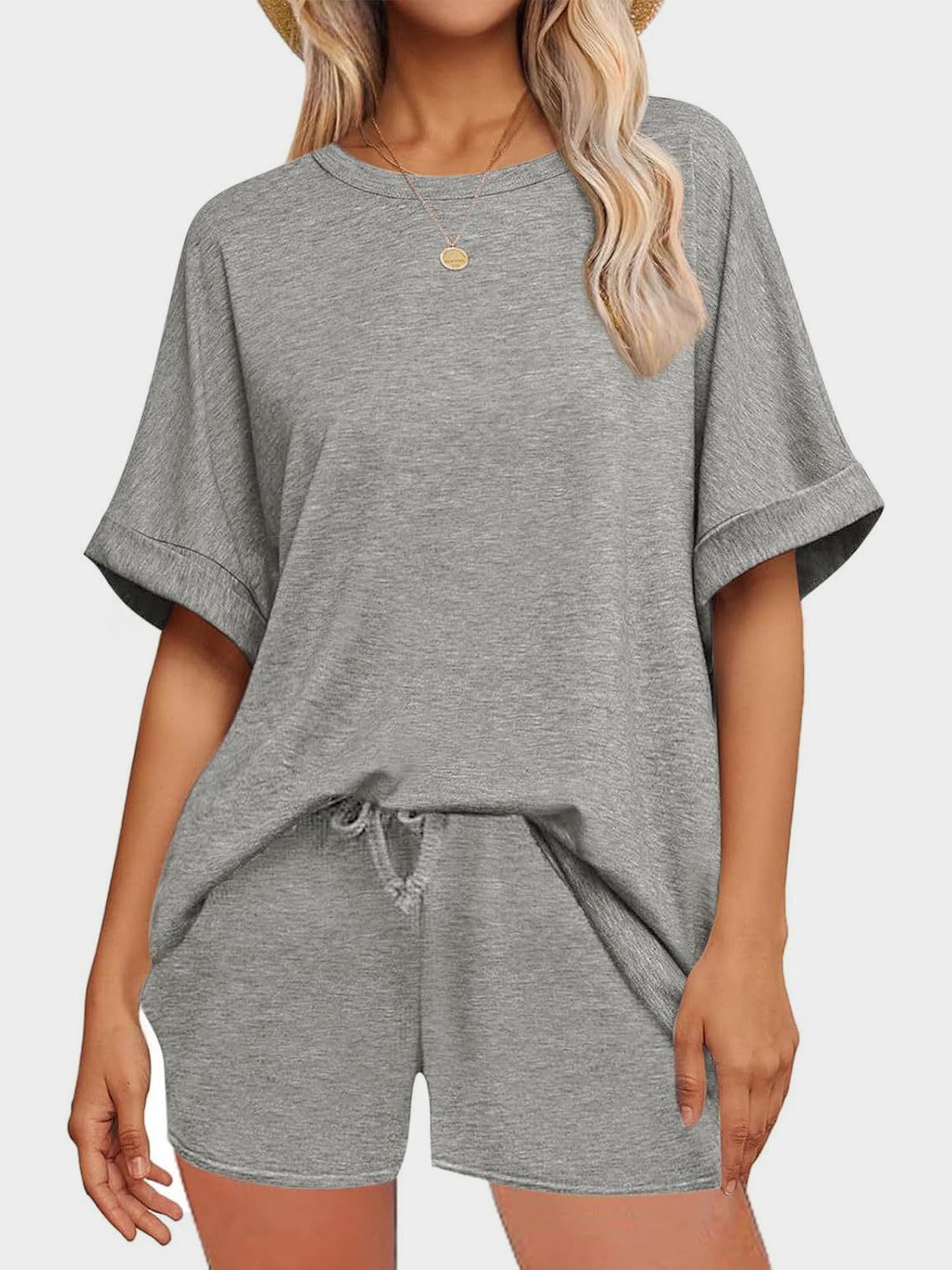 Gray relaxed fit tee and shorts loungewear set with drawstring waist.