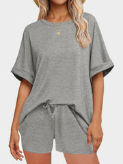 Gray relaxed fit tee and shorts loungewear set with drawstring waist.
