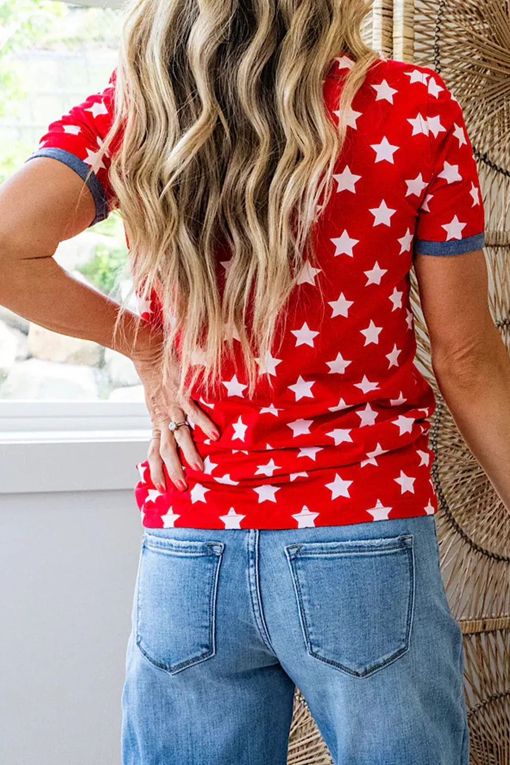 Red star print tunic t-shirt with blue trim on sleeves.