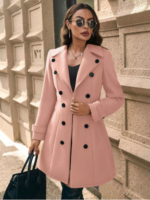 Pale Blush double-breasted wool blend trench coat with cuffed sleeves and black buttons.
