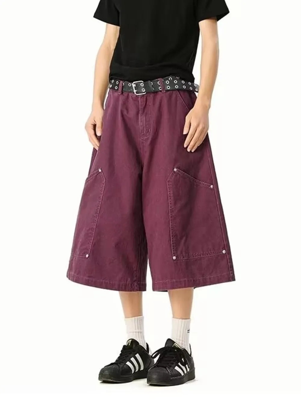 Relaxed fit purple cargo shorts with utility pockets and below-knee length.