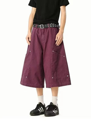 Relaxed fit purple cargo shorts with utility pockets and below-knee length.