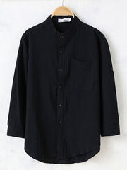 Men's black casual button-up shirt with band collar and chest pocket