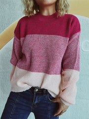 Colorblock textured knit pullover sweater in pink and magenta with crew neck.