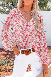 Floral puff sleeve v-neck blouse in blush pink with a casual fit.