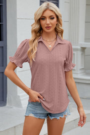 Blush pink eyelet polo blouse with short ruched sleeves.
