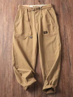 Men's tan loose fit cargo pants with belt and pockets