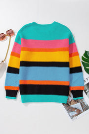 Rainbow stripe knit crewneck sweater in turquoise and pastel blue with multicolor stripes and diamond pattern on sleeves.