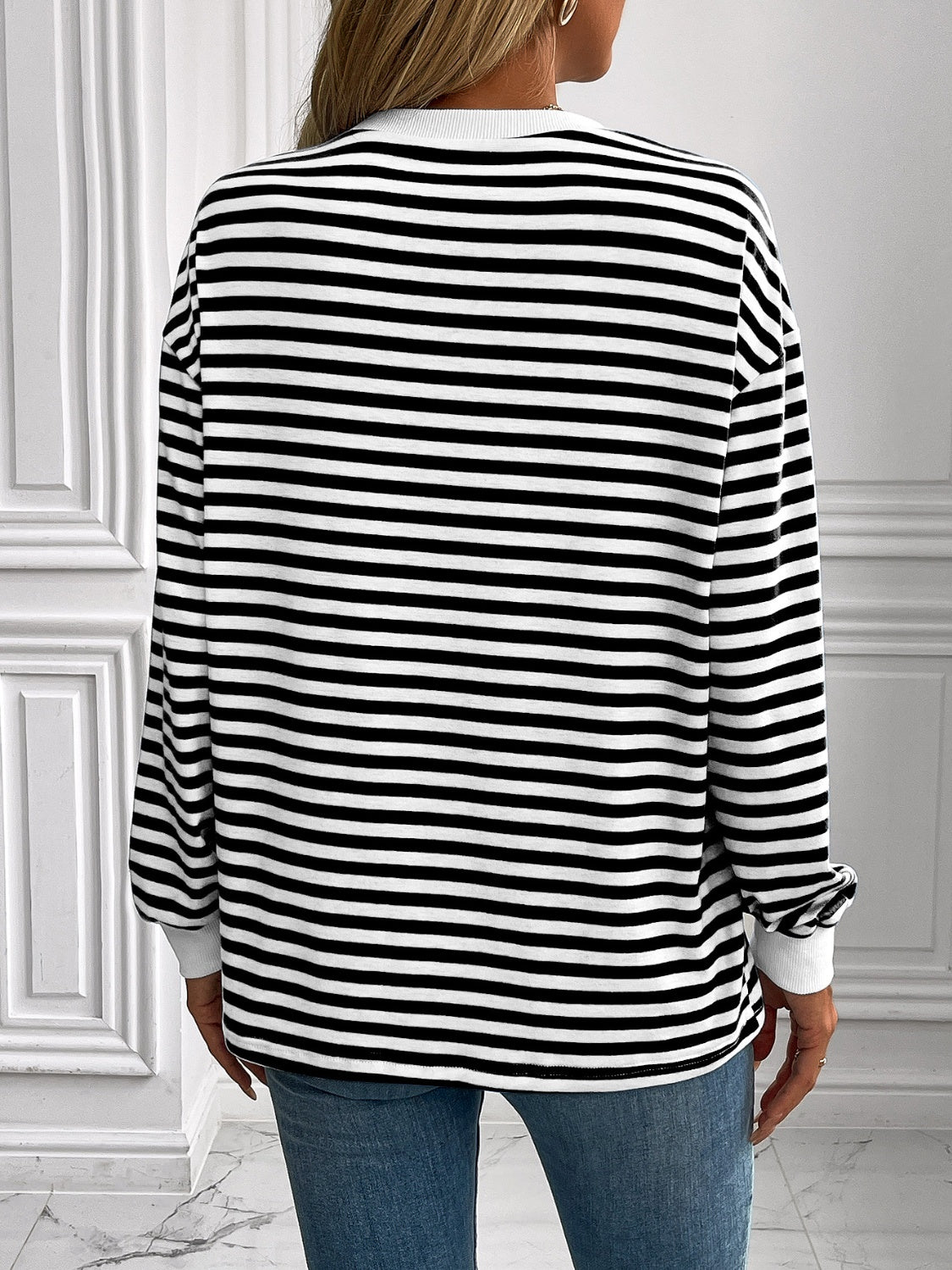 Black and white horizontal stripe crewneck sweatshirt with cuffs