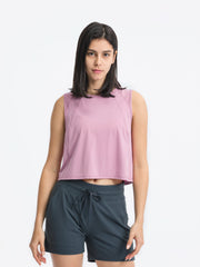 Dusty Pink cropped active tank with mesh inset back detail and crew neck.
