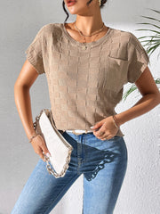 Camel textured knit pocket tee with crew neck and short sleeves.