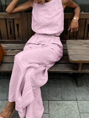 Pink sleeveless crop top and wide-leg pants set with crew neck and elastic waist.