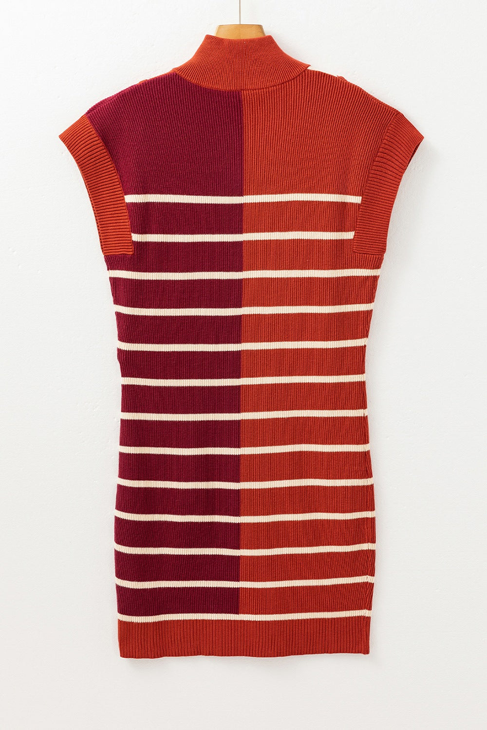 Colorblock ribbed mini dress with mock neck and horizontal stripes in terracotta and burgundy.