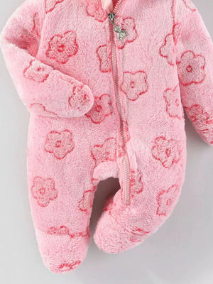Pink plush hooded one-piece for baby with all-over floral pattern and bear zipper pull.