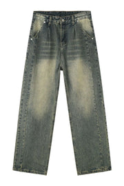 Faded wash baggy carpenter jeans in medium color with a relaxed fit.