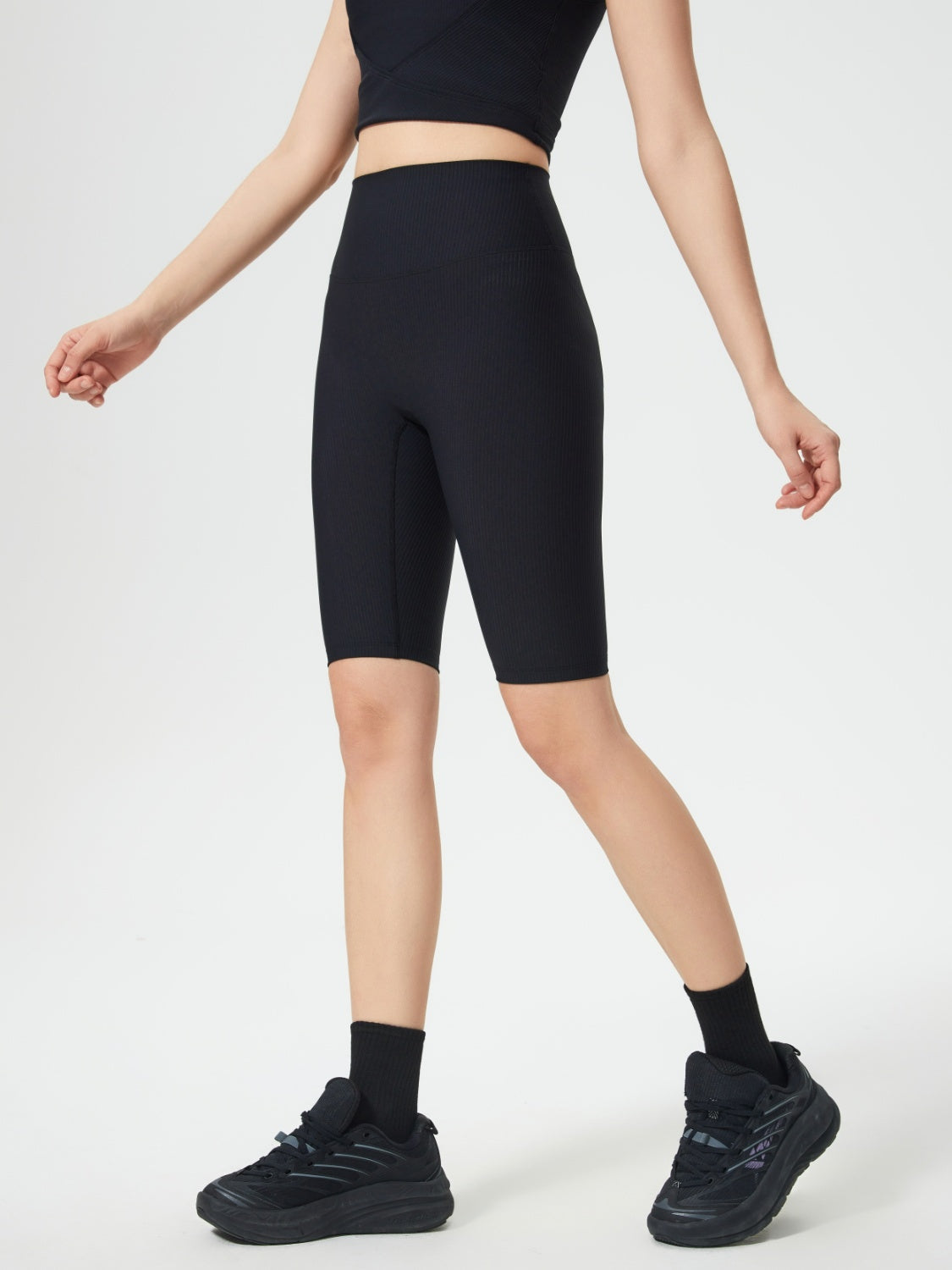 Black ribbed contour cycling shorts with a high waist