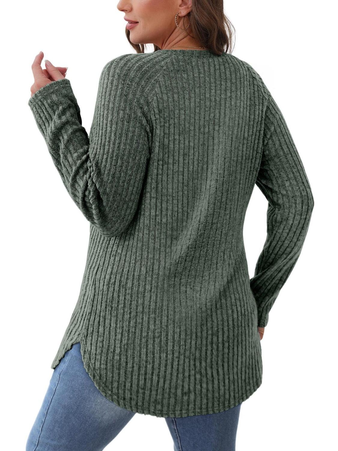 Moss ribbed knit sweater with raglan sleeves and asymmetric hem detail.