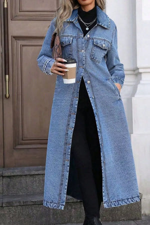 Longline blue denim jacket with pockets, button front, and collar.