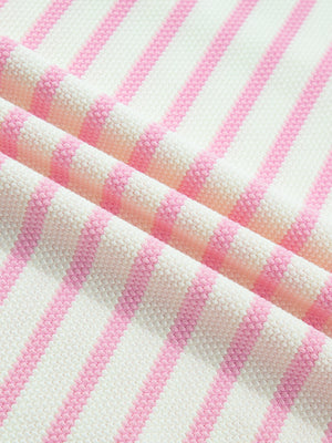 Ruffled short-sleeve blouse in pink and white stripes, cotton knit fabric.