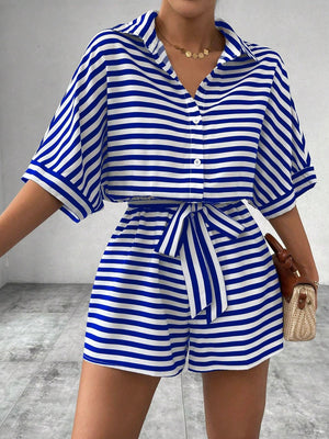 Royal blue and white striped shirt romper with self-tie belt and button front.