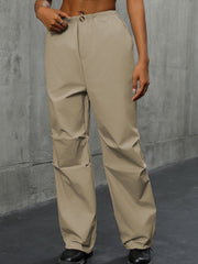 Khaki gathered-leg utility trousers with cuffed ankles and a comfortable fit.