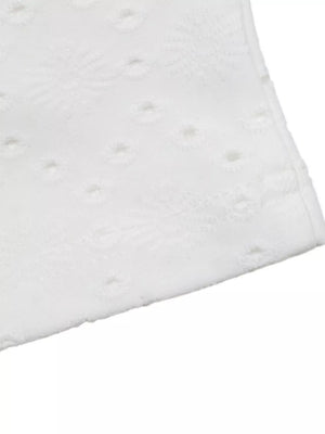 White eyelet lace detail maternity shirt fabric close-up