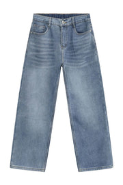 Oversized fade wash denim trousers in medium blue, wide leg, relaxed fit jeans.