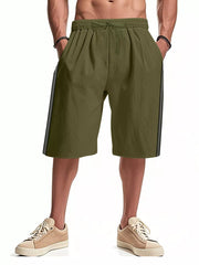 Men's military green bermuda shorts with drawstring and side stripe detail.